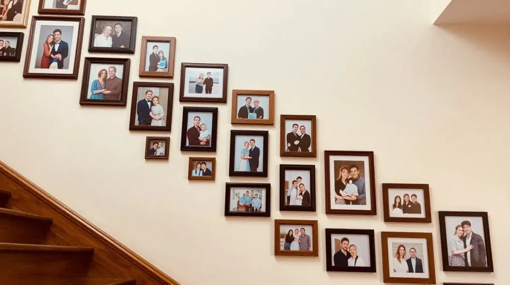 Decorate Your Staircase Wall With a Flowing Arrangement